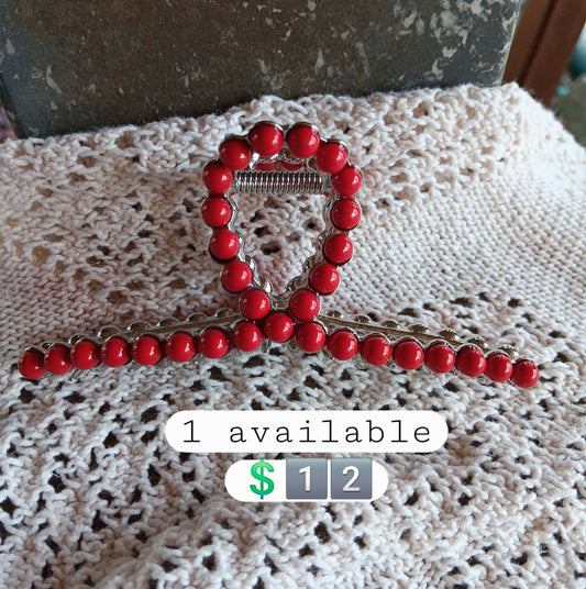 Red metal claw clip
